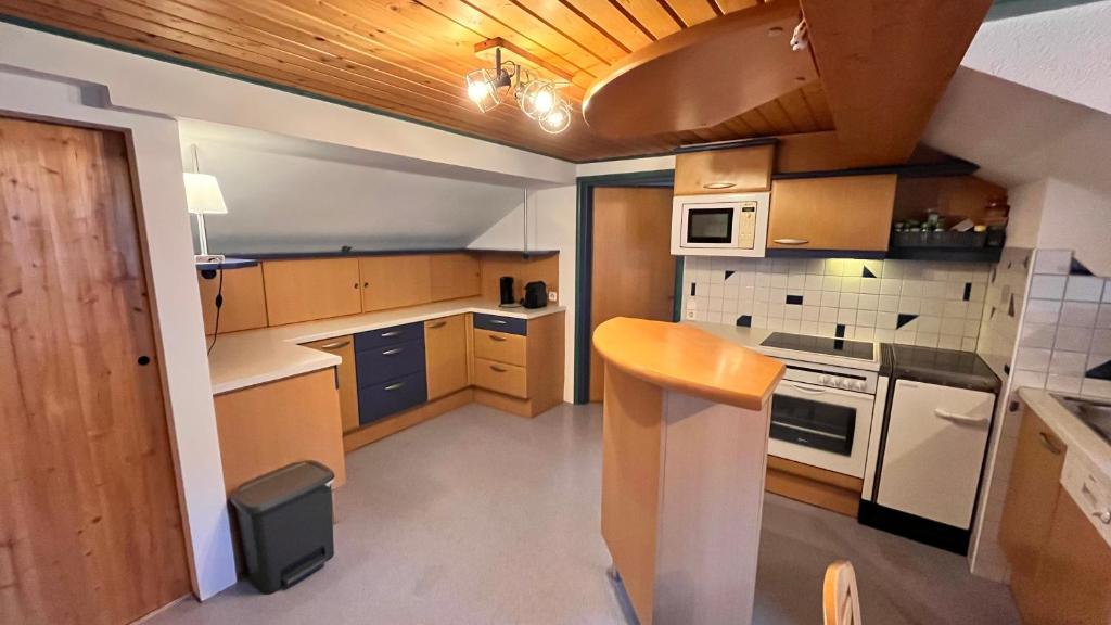 Kuchyň nebo kuchyňský kout v ubytování Jagerheim Apartments Flattach