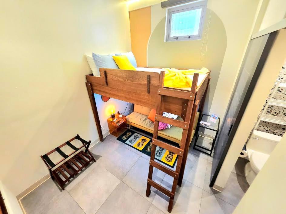 Postel nebo postele na pokoji v ubytování Somos Hotel San Juan
