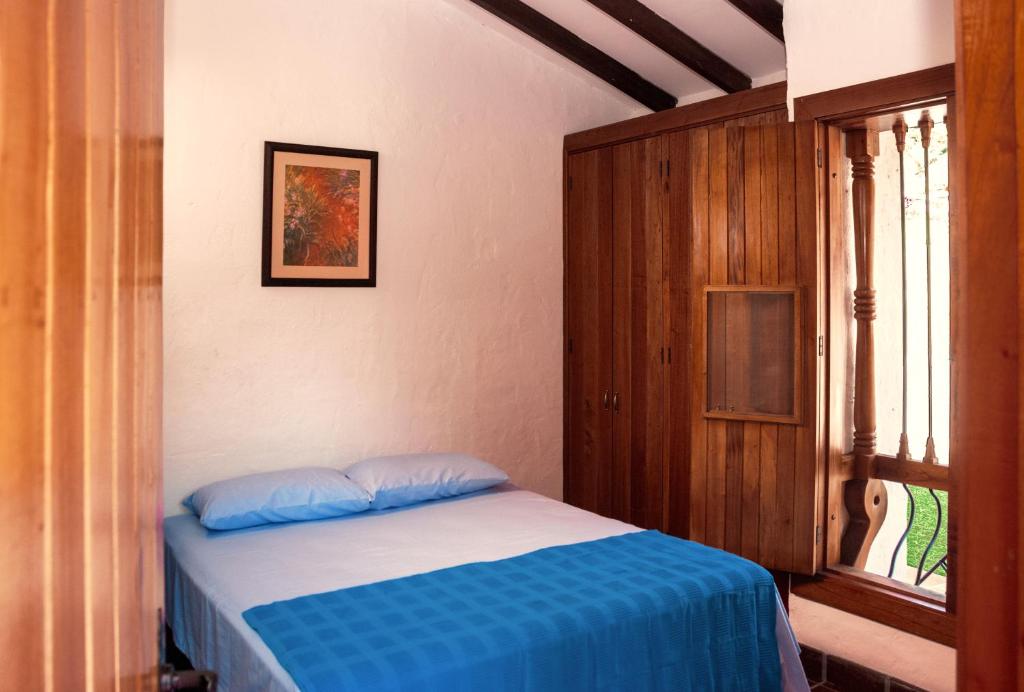 Postel nebo postele na pokoji v ubytování Hacienda La Tulia Eco Hotel