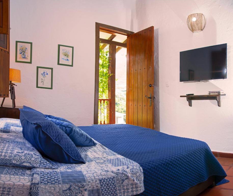 Postel nebo postele na pokoji v ubytování Hacienda La Tulia Eco Hotel