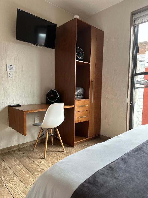 Postel nebo postele na pokoji v ubytování Hotel Del Valle