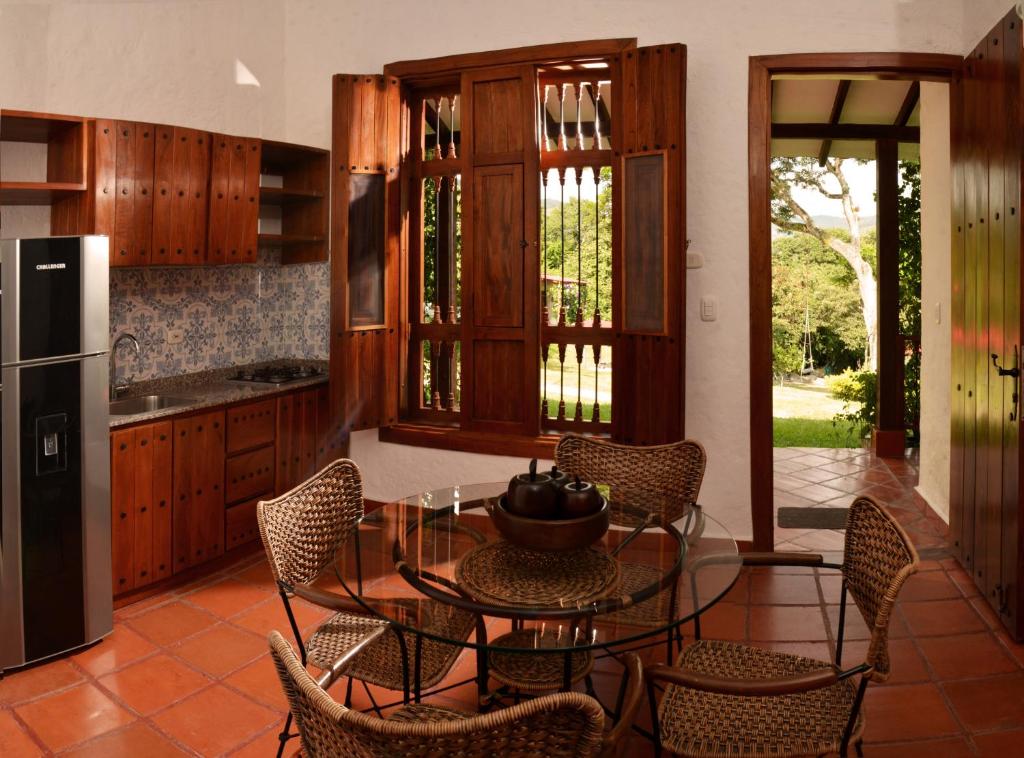 Kuchyň nebo kuchyňský kout v ubytování Hacienda La Tulia Eco Hotel