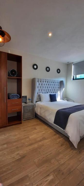 Postel nebo postele na pokoji v ubytování Hotel Del Valle