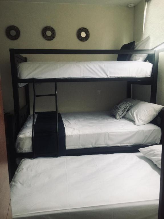 Postel nebo postele na pokoji v ubytování Hotel Del Valle