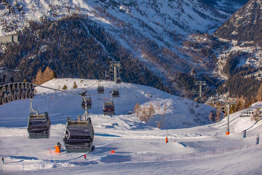 Chamonix Sud - Bâtiment E 421 - Happy Rentals v zime