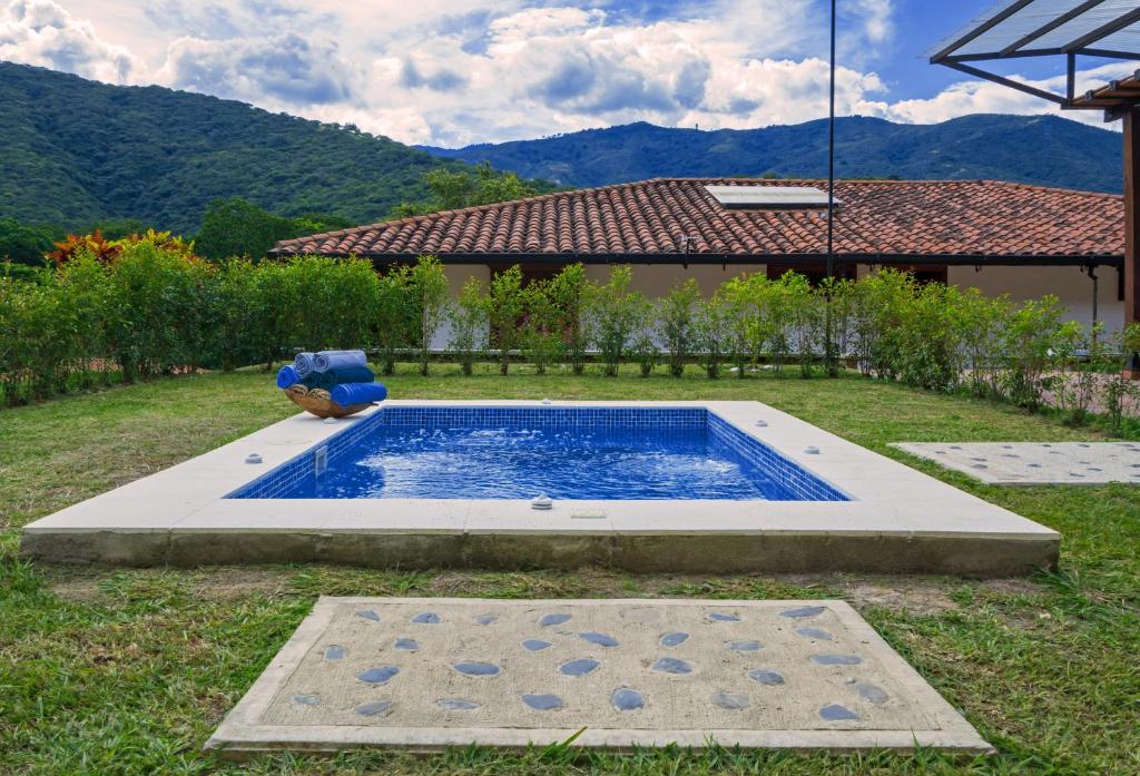 Bazén v ubytování Hacienda La Tulia Eco Hotel nebo v jeho okolí