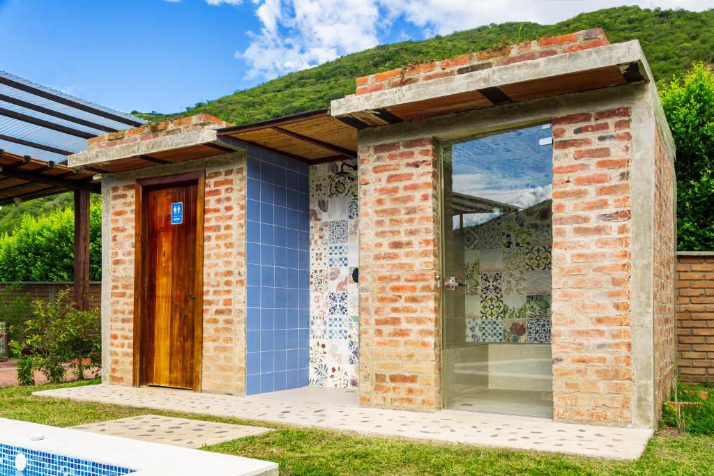 Bazén v ubytování Hacienda La Tulia Eco Hotel nebo v jeho okolí