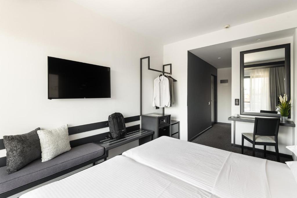 TV a/nebo společenská místnost v ubytování Park Hotel