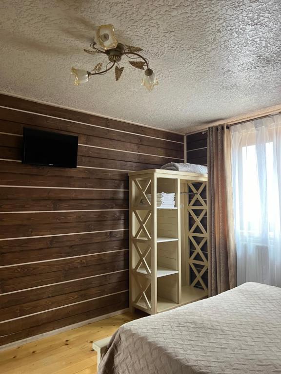 Postel nebo postele na pokoji v ubytování Aura Karpat