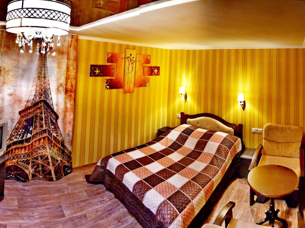 Ένα ή περισσότερα κρεβάτια σε δωμάτιο στο ApartLux 1