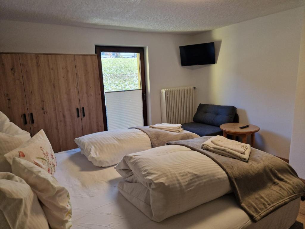 Postel nebo postele na pokoji v ubytování Panorama-Ferienhaus im Stubaital