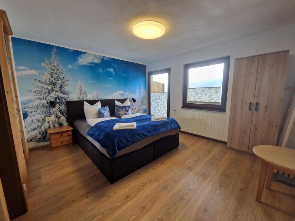Postel nebo postele na pokoji v ubytování Panorama-Ferienhaus im Stubaital