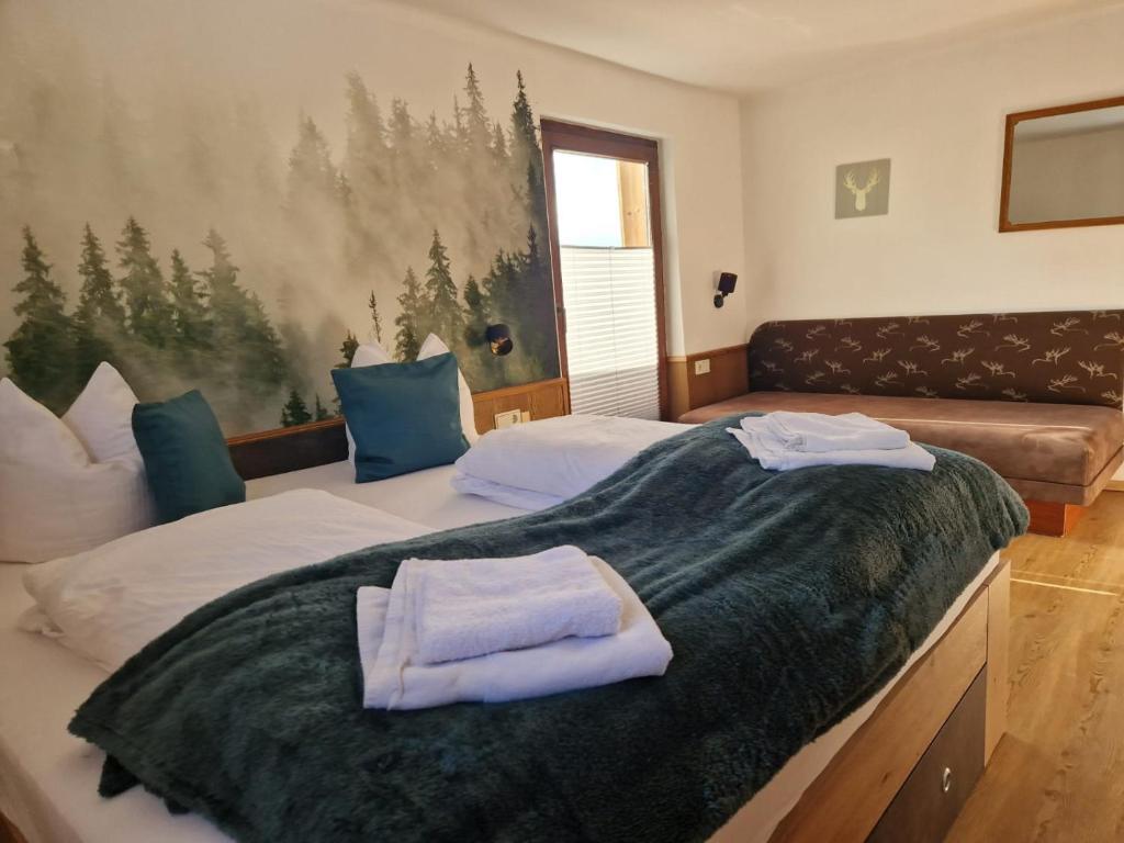 Postel nebo postele na pokoji v ubytování Panorama-Ferienhaus im Stubaital