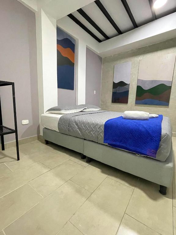 Postel nebo postele na pokoji v ubytování M1145 Aparta Loft
