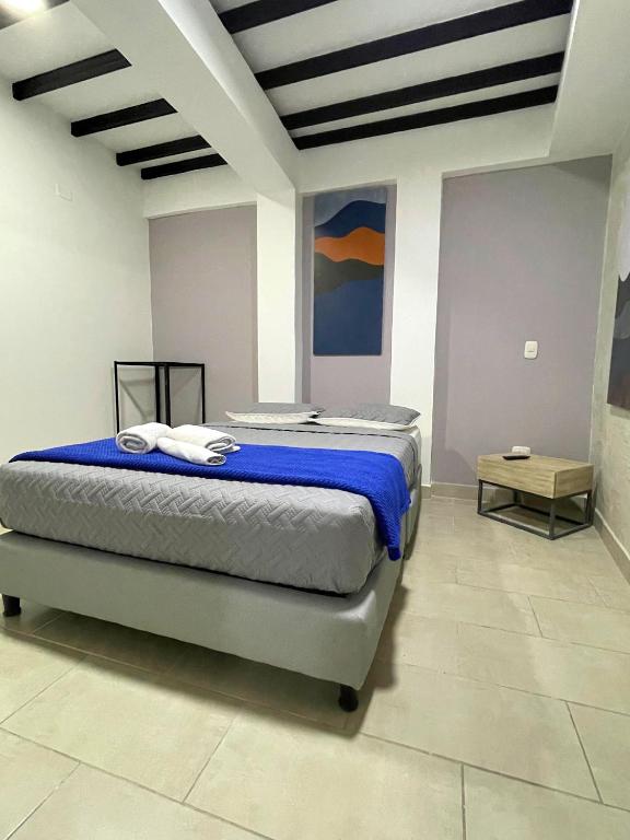 Postel nebo postele na pokoji v ubytování M1145 Aparta Loft