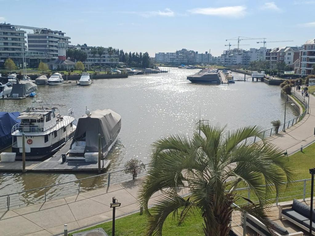Apart , Departamento condominio en Bahia grande Nordelta con balcon y vista a la bahia , piscina ext