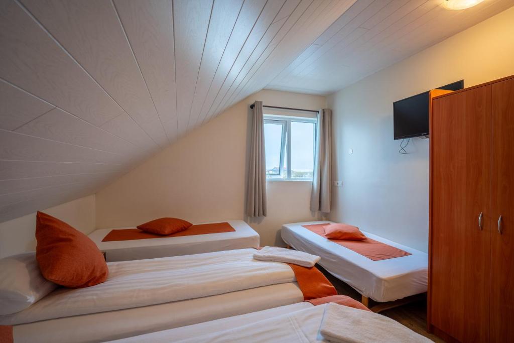 Postel nebo postele na pokoji v ubytování Gerdi Guesthouse
