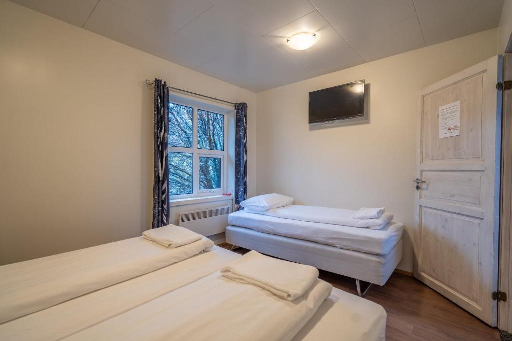 Postel nebo postele na pokoji v ubytování Gerdi Guesthouse
