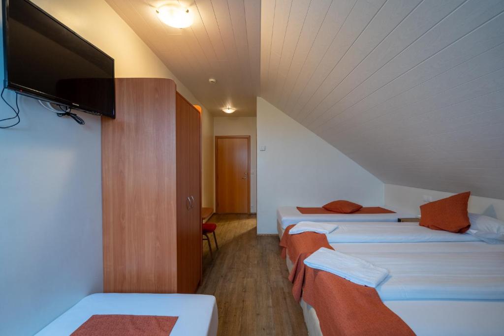 Postel nebo postele na pokoji v ubytování Gerdi Guesthouse