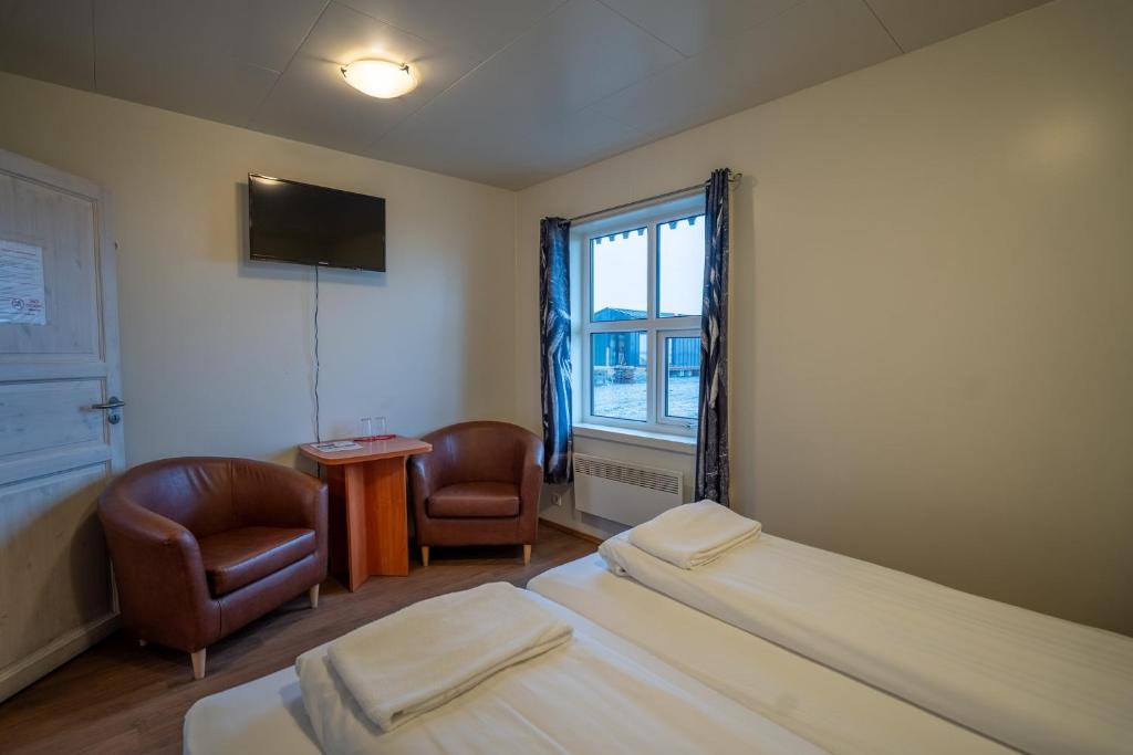 Postel nebo postele na pokoji v ubytování Gerdi Guesthouse