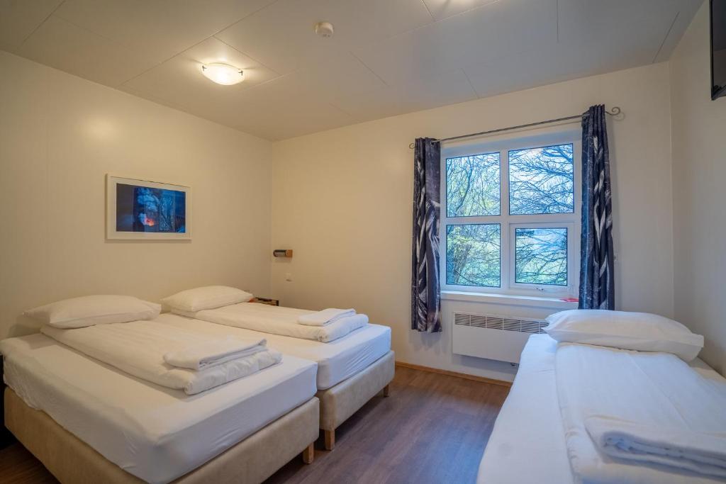 Postel nebo postele na pokoji v ubytování Gerdi Guesthouse