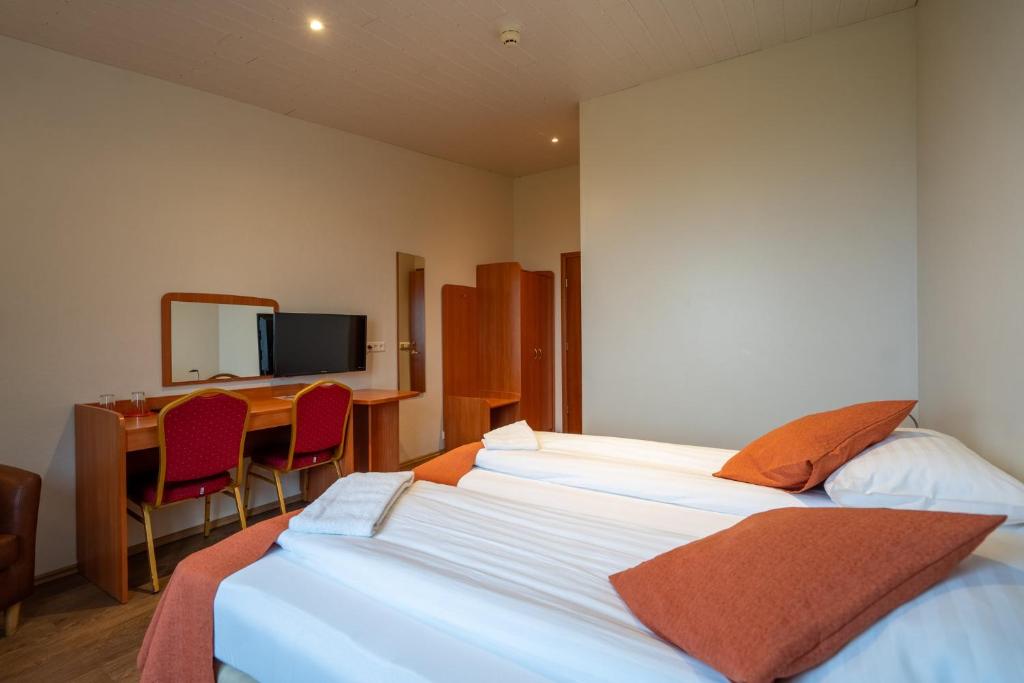 Postel nebo postele na pokoji v ubytování Gerdi Guesthouse