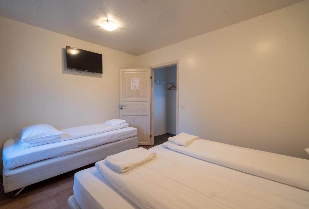 Postel nebo postele na pokoji v ubytování Gerdi Guesthouse