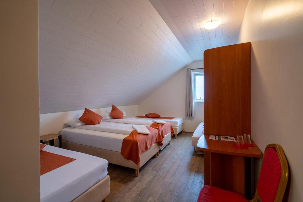 Postel nebo postele na pokoji v ubytování Gerdi Guesthouse