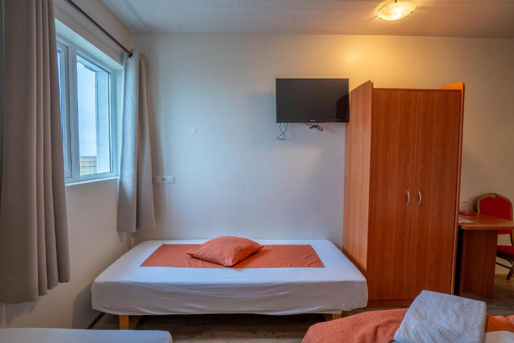 Postel nebo postele na pokoji v ubytování Gerdi Guesthouse