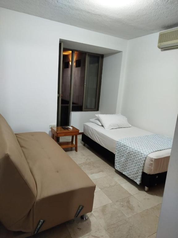Postel nebo postele na pokoji v ubytování Casa San Joaquin