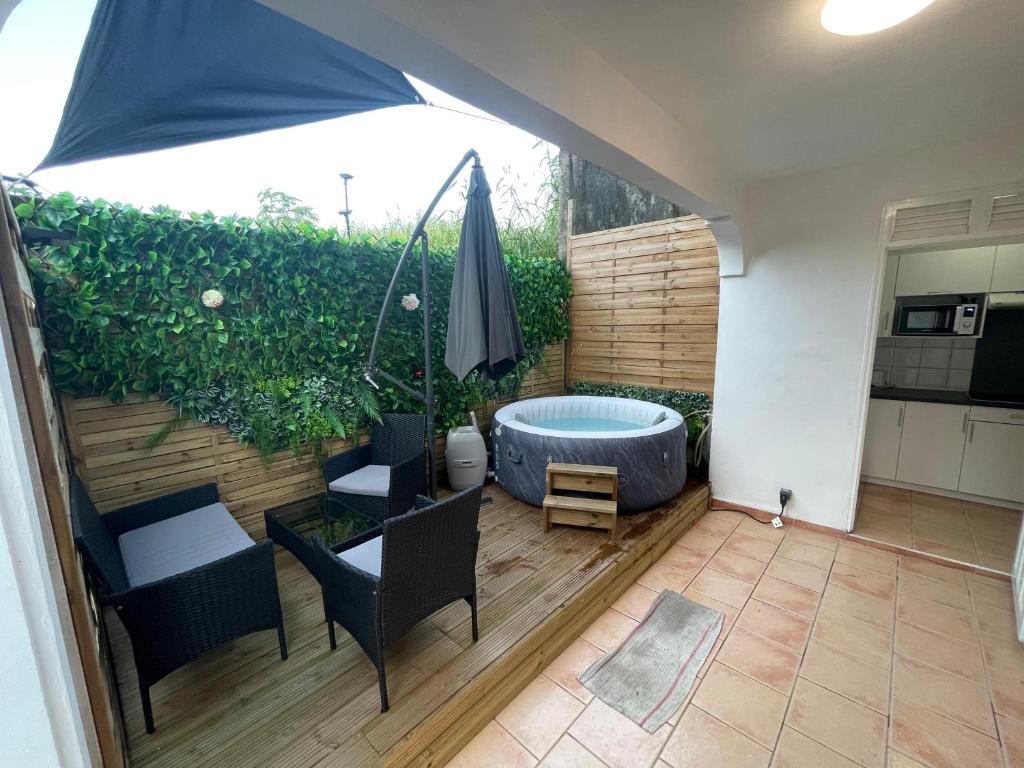 Zahrada ubytování Havre de détente avec jaccuzi