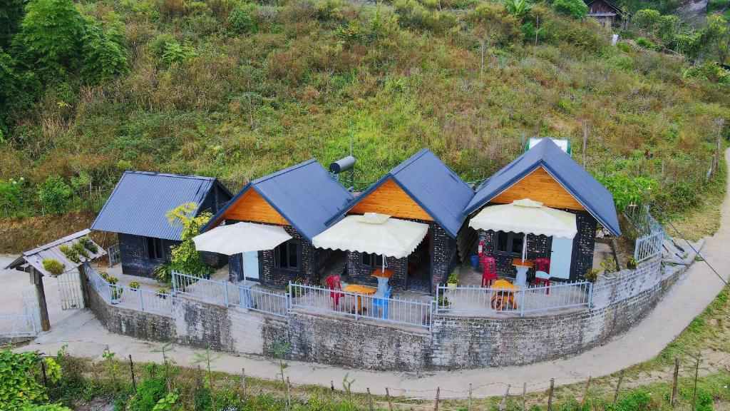 an aerial view of a restaurant on a hill at MAMA LILI'S HOMESTAY in Hao Su Ngai