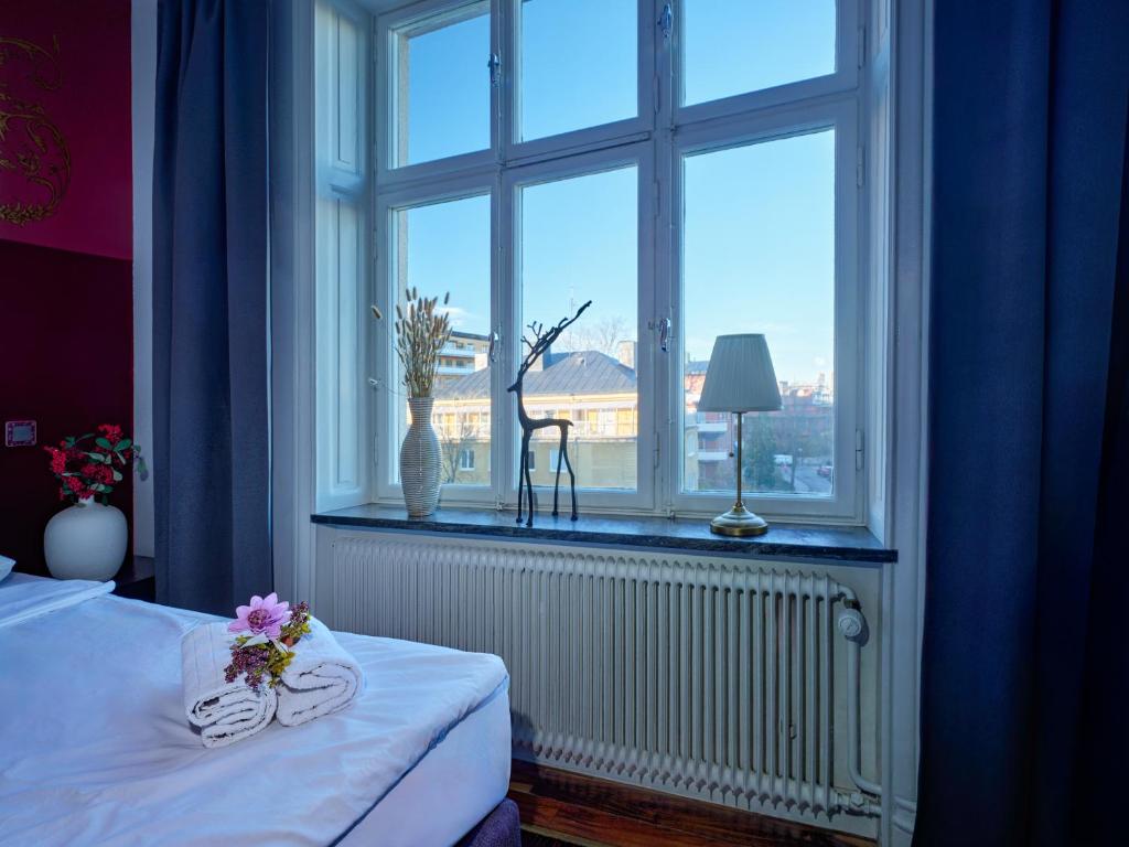 Postel nebo postele na pokoji v ubytování City Hotel Söder