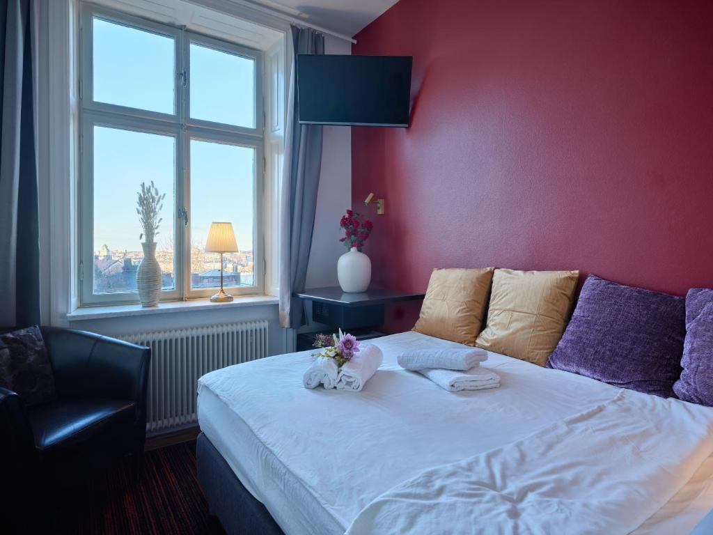 Postel nebo postele na pokoji v ubytování City Hotel Söder