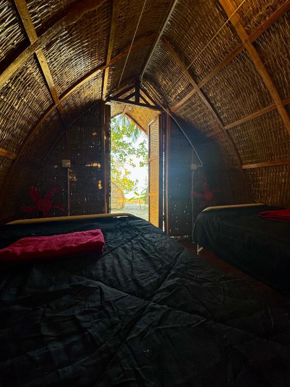 Postel nebo postele na pokoji v ubytování Rafikis Retreat