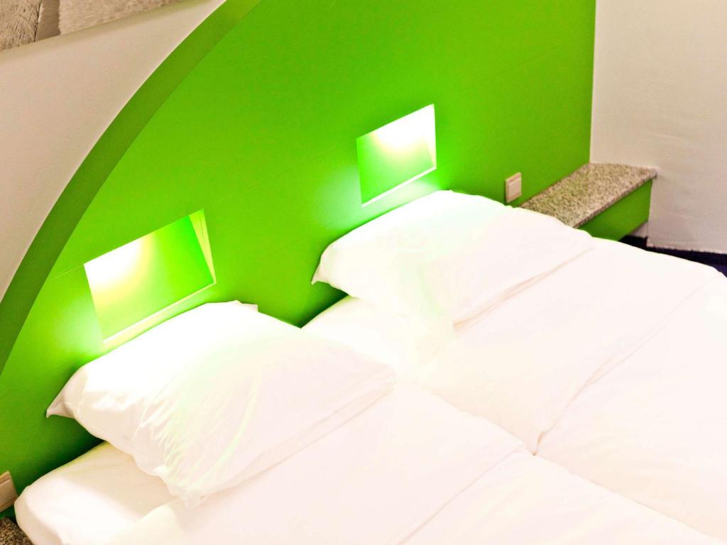 Postel nebo postele na pokoji v ubytování Hotel Siru Brussels