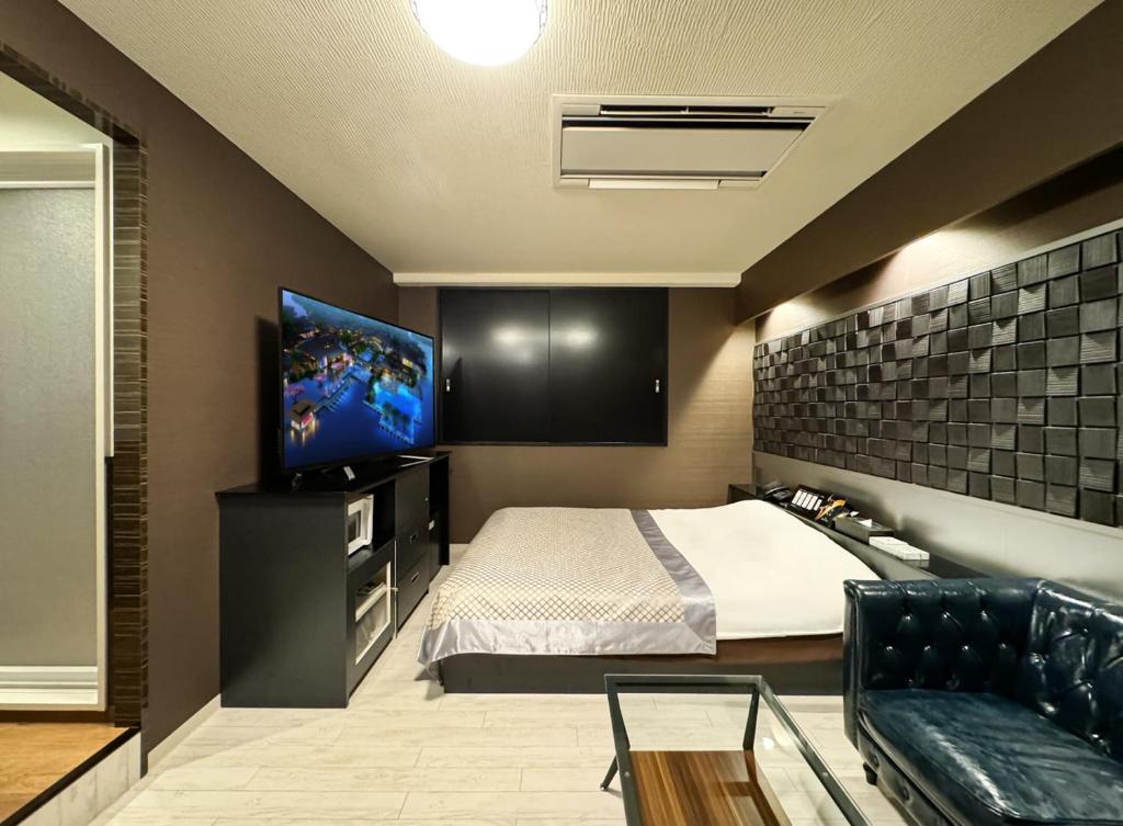 TV a/nebo společenská místnost v ubytování Hotel Gran Villa