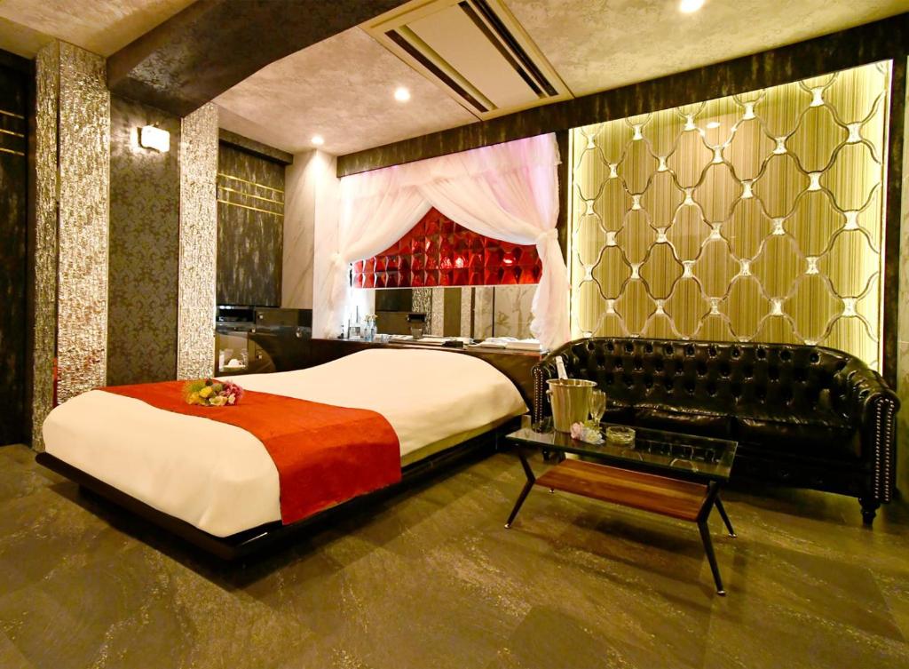 Postel nebo postele na pokoji v ubytování Hotel Gran Villa