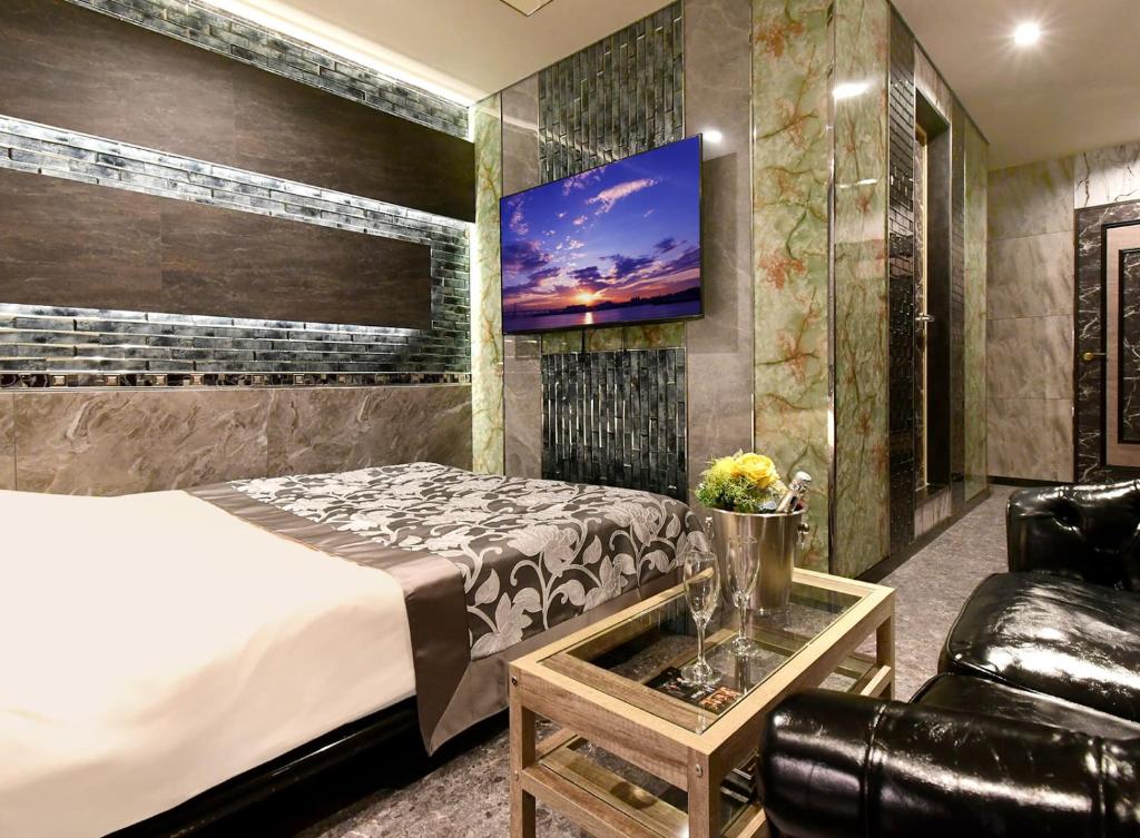 Postel nebo postele na pokoji v ubytování Hotel Gran Villa