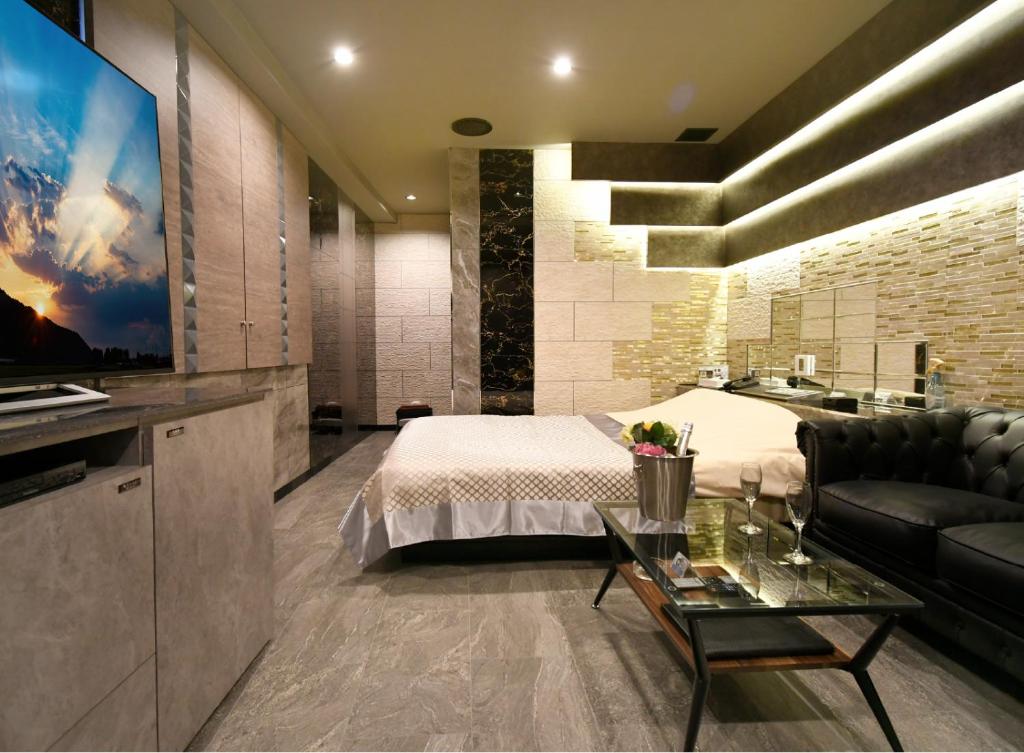 TV a/nebo společenská místnost v ubytování Hotel Gran Villa