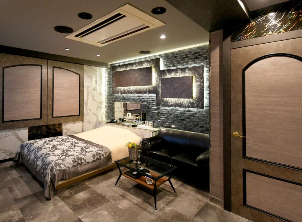 Postel nebo postele na pokoji v ubytování Hotel Gran Villa