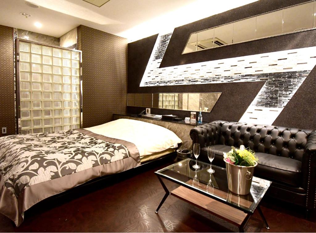 Postel nebo postele na pokoji v ubytování Hotel Gran Villa