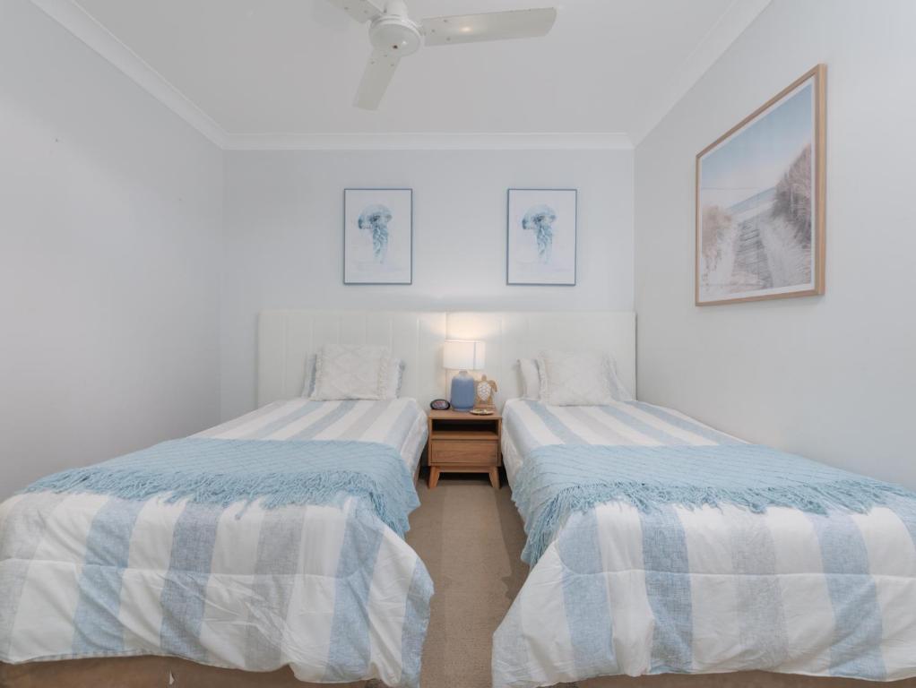 Postel nebo postele na pokoji v ubytování Koola Beach Apartments Bargara