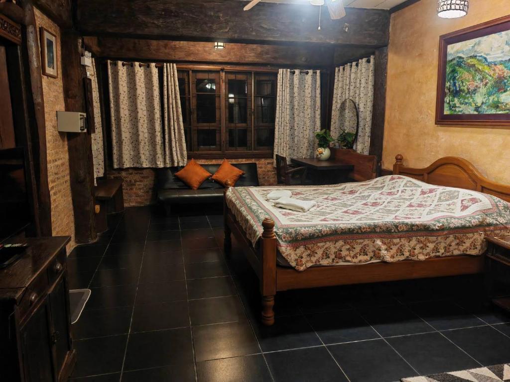 Postel nebo postele na pokoji v ubytování ธารทอง ลอดจ์ Tharnthong Lodge