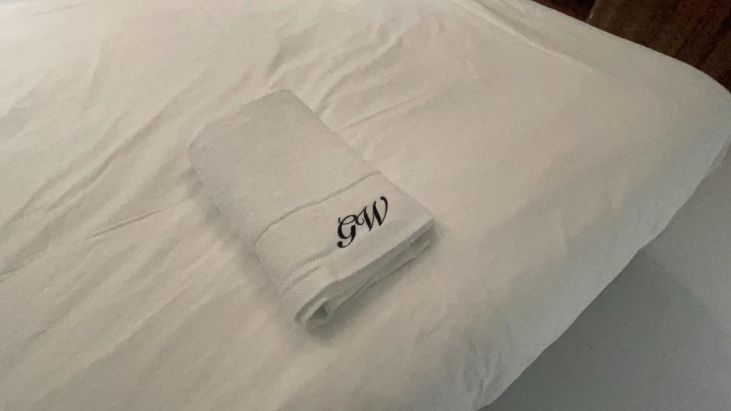 Postel nebo postele na pokoji v ubytování Grandwest Apartment Ajah