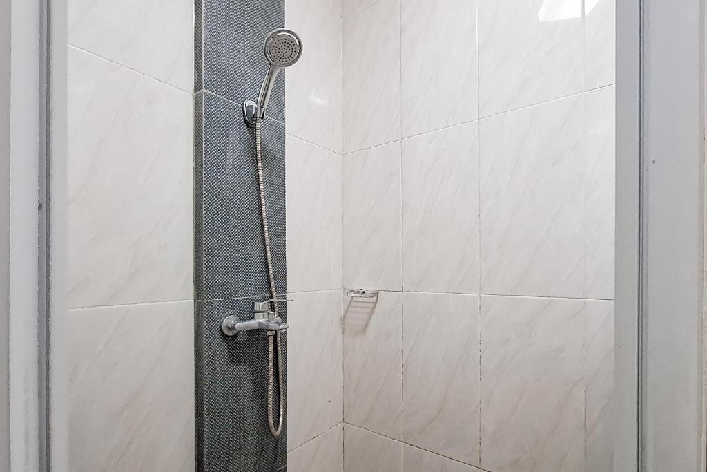 Koupelna v ubytování Urbanview Hotel Tridaya Cisarua Puncak