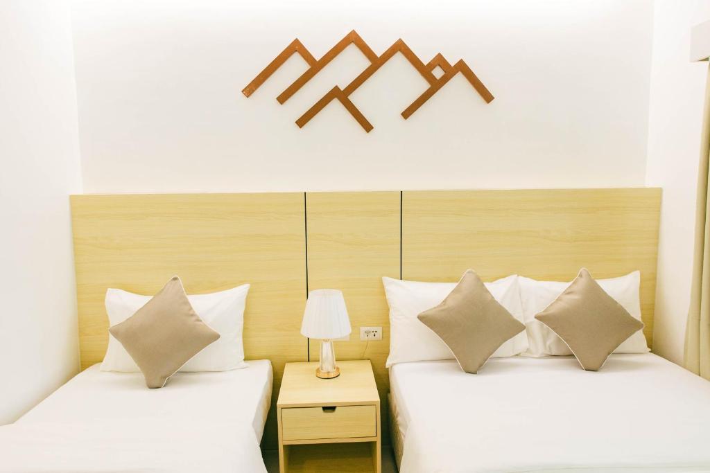 Postel nebo postele na pokoji v ubytování Panglao Vista Suites by SMS Hospitality