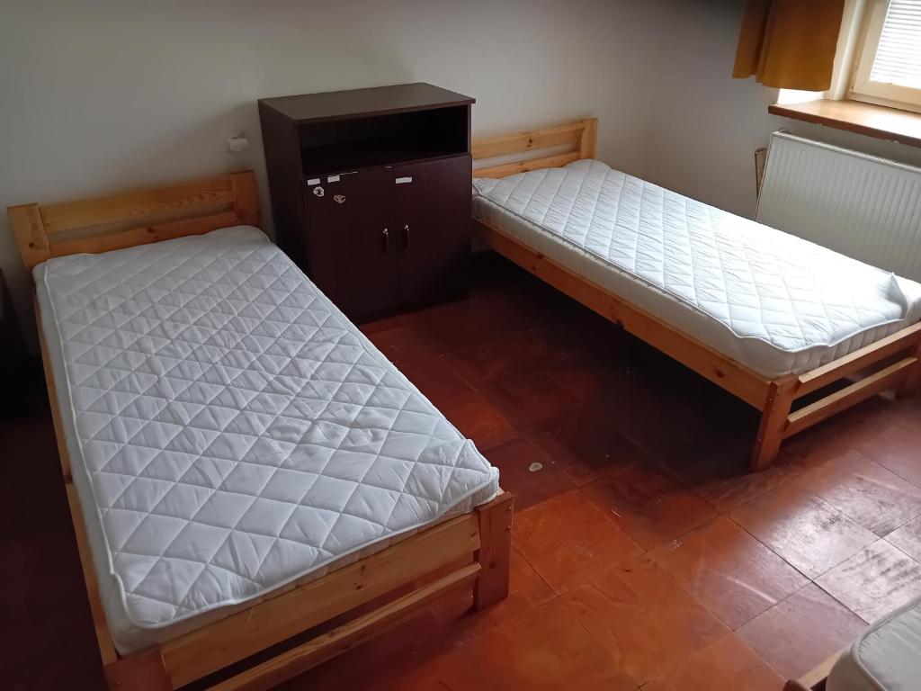 Postel nebo postele na pokoji v ubytování Statek