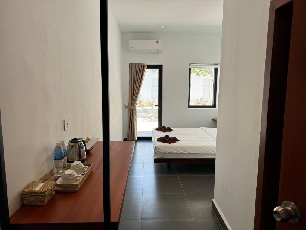 Postel nebo postele na pokoji v ubytování Onederz Koh Rong