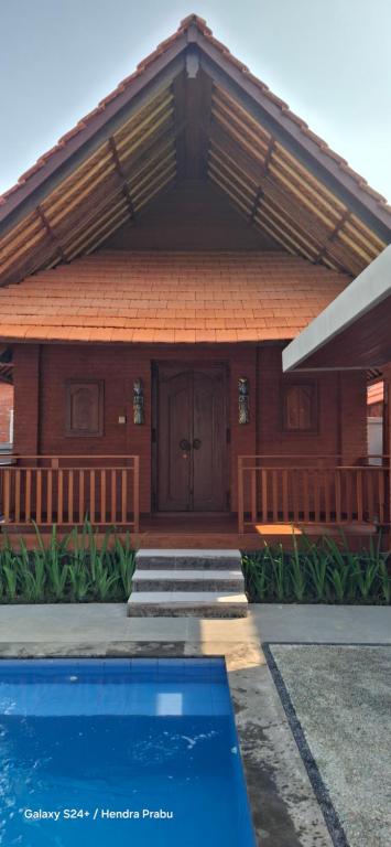 Bazén v ubytování Uma Mani Villa Bali nebo v jeho okolí